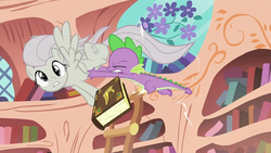 Size: 1280x723 | Tagged: safe, screencap, fluttershy, spike, g4, the return of harmony, book, derp, discorded, duo, golden oaks library, ladder, surprised