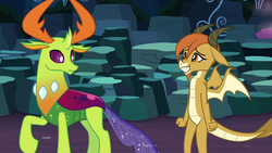 Size: 1920x1080 | Tagged: safe, screencap, ocellus, thorax, changedling, changeling, dragon, g4, uprooted, changeling king, cute, diaocelles, disguise, disguised changeling, dragon ocellus, dragoness, duo, female, king thorax, looking back, male, raised hoof, sheepish grin
