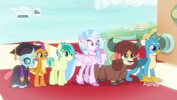 Size: 1920x1080 | Tagged: safe, screencap, gallus, ocellus, sandbar, silverstream, smolder, yona, changedling, changeling, classical hippogriff, dragon, griffon, hippogriff, pony, yak, g4, uprooted, bow, checkerboard, cloven hooves, dragoness, female, graduation cap, hair bow, hat, robes, student six