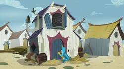 Size: 1280x720 | Tagged: safe, screencap, gallus, griffon, g4, uprooted, barrel, discovery family logo, firewood, grampa gruff's house, griffonstone, hay, house, knocking, knocking on door, male, solo, spider web, wings