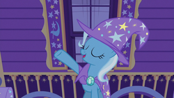 Size: 1280x720 | Tagged: safe, screencap, trixie, pony, unicorn, g4, uncommon bond, cape, clothes, cute, diatrixes, eyes closed, female, hat, mare, open mouth, raised hoof, solo, trixie's cape, trixie's hat, trixie's wagon