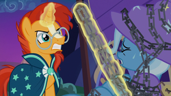 Size: 1280x720 | Tagged: safe, screencap, sunburst, trixie, pony, g4, uncommon bond, chains, glowing horn, gritted teeth, horn, out of context, pulling, sweat