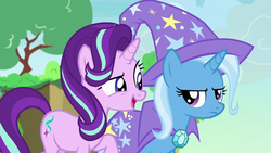 Size: 1280x720 | Tagged: safe, screencap, starlight glimmer, trixie, pony, unicorn, g4, to change a changeling, cape, changeling kingdom, clothes, cute, duo, female, hat, mare, raised eyebrow, raised hoof, smiling, trixie is not amused, trixie's cape, trixie's hat, unamused