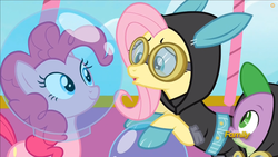Size: 882x496 | Tagged: safe, screencap, fluttershy, pinkie pie, spike, dragon, earth pony, pegasus, pony, g4, sparkle's seven, astronaut pinkie, bunny ears, cloak, clothes, costume, dangerous mission outfit, discovery family logo, fish bowl, goggles, hood, hoodie