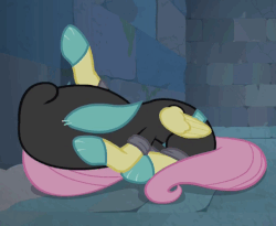 Size: 446x365 | Tagged: safe, screencap, fluttershy, pony, g4, season 9, sparkle's seven, animated, bunny ears, claustrophobia, clothes, costume, dangerous mission outfit, female, gif, goggles, hoodie, scared, solo