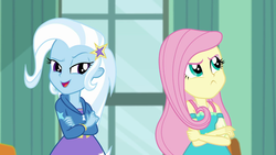 Size: 1280x720 | Tagged: safe, screencap, fluttershy, trixie, a little birdie told me, equestria girls, g4, my little pony equestria girls: better together, cute, female, fluttershy is not amused, unamused