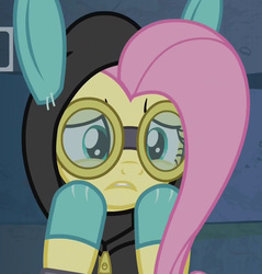 Size: 1031x1080 | Tagged: safe, screencap, fluttershy, pony, g4, season 9, sparkle's seven, bunny ears, clothes, costume, cropped, dangerous mission outfit, female, goggles, hoodie, mare, solo