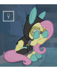 Size: 574x712 | Tagged: safe, screencap, fluttershy, pony, g4, season 9, sparkle's seven, animated, bunny ears, clothes, costume, covering eyes, cropped, dangerous mission outfit, female, gif, goggles, hoodie, shaking, shivering, solo