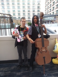 Size: 4160x3120 | Tagged: safe, octavia melody, human, g4, babscon, babscon 2019, bow (instrument), brony, cello, clothes, convention, cosplay, costume, irl, irl human, musical instrument, photo