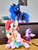 Size: 768x1024 | Tagged: safe, artist:nekokevin, princess luna, twilight sparkle, oc, oc:poniko, alicorn, earth pony, pegasus, pony, g4, 4de, calendar, clothes, female, hoof shoes, irl, jewelry, mare, open mouth, peytral, photo, plushie, regalia, sitting, size difference, smiling, socks, spread wings, starlight's little twibird, striped socks, twilight sparkle (alicorn), wings