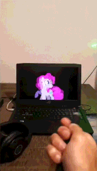 Size: 408x720 | Tagged: safe, artist:stormxf3, pinkie pie, earth pony, human, pony, man versus ponies, g4, animated, behaving like a cat, bipedal, computer, cute, diapinkes, female, flashlight (object), fourth wall, gif, hand, headphones, irl, irl human, laptop computer, laser pointer, mare, offscreen character, offscreen human, photo, ponies in real life, twitter link
