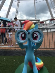 Size: 720x960 | Tagged: safe, photographer:henrychan, rainbow dash, human, pegasus, pony, g4, binoculars, bipedal, friendship carnival, hong kong, irl, irl human, photo, silly, silly pony, solo focus, statue
