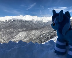 Size: 3736x3021 | Tagged: safe, artist:spacelight_unicorn, oc, oc only, oc:spacelight, pony, unicorn, clothes, female, high res, horn, irl, mare, mountain, photo, plushie, russia, scenery, snow, socks, solo, striped socks, unicorn oc, winter