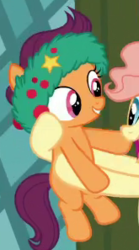 Size: 165x297 | Tagged: safe, screencap, jolly fir, merry cotton, earth pony, pony, a hearth's warming tail, g4, background pony, cropped, female, filly, foal, solo focus, wreath