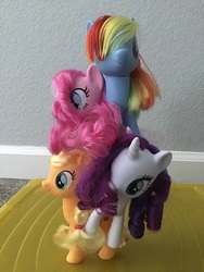 Size: 3264x2448 | Tagged: safe, applejack, pinkie pie, rainbow dash, rarity, earth pony, pegasus, pony, unicorn, g4, female, funny, high res, irl, photo, pinkie pie riding rarity, ponies riding ponies, ponies riding ponies riding ponies riding ponies, pony pile, rainbow dash riding pinkie pie, rarity riding applejack, riding, tower of pony, toy