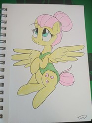 Size: 776x1040 | Tagged: safe, artist:taurson, fluttershy, pegasus, pony, g4, alternate hairstyle, clothes, cute, female, hair bun, looking up, mare, one-piece swimsuit, raised hoof, shyabetes, sitting, solo, spread wings, swimsuit, three quarter view, traditional art, wings