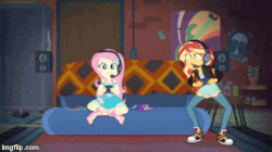 Size: 360x202 | Tagged: safe, screencap, fluttershy, sunset shimmer, equestria girls, equestria girls series, g4, game stream, spoiler:eqg series (season 2), angry, animated, controller, converse, female, frustrated, gamer sunset, gamershy, geode of fauna, headphones, imgflip, magical geodes, shoes, sneakers, video game