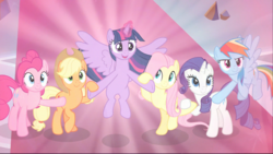 Size: 1745x984 | Tagged: safe, screencap, applejack, fluttershy, pinkie pie, rainbow dash, rarity, twilight sparkle, alicorn, earth pony, pegasus, pony, unicorn, g4, the beginning of the end, bipedal, cropped, female, flying, glowing horn, holding hooves, horn, light, magic, magic aura, magic of friendship, mane six, mare, smiling, teamwork, twilight sparkle (alicorn)