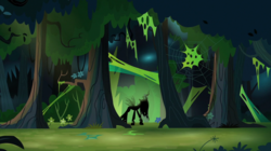 Size: 2000x1118 | Tagged: safe, screencap, queen chrysalis, changeling, changeling queen, g4, the beginning of the end, everfree forest, female, forest, silhouette, solo, spider web, tree