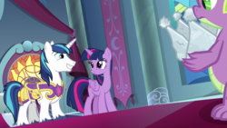 Size: 1920x1080 | Tagged: safe, screencap, shining armor, spike, twilight sparkle, alicorn, dragon, pony, unicorn, g4, sparkle's seven, canterlot throne room, claws, crown, female, hard-won helm of the sibling supreme, implied spike, jewelry, looking at each other, male, mare, regalia, royal guard armor, smiling, sparkle siblings, stallion, twilight sparkle (alicorn), winged spike, wings