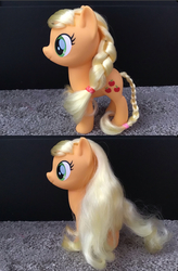 Size: 782x1189 | Tagged: safe, applejack, earth pony, pony, g4, my little pony: the movie, braid, carpet, female, irl, long hair, loose hair, photo, toy