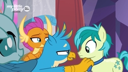 Size: 1920x1080 | Tagged: safe, screencap, gallus, ocellus, sandbar, smolder, changedling, changeling, dragon, earth pony, griffon, pony, g4, she's all yak, amused, bowtie, claws, confused, crossed arms, curved horn, cutie mark, folded wings, grabbing, horn, horns, lidded eyes, lip bite, male, school of friendship, smiling, smirk, smugder, stallion, talons, teasing, teenaged dragon, teenager, wings, young stallion
