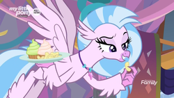 Size: 1920x1080 | Tagged: safe, screencap, silverstream, classical hippogriff, hippogriff, g4, she's all yak, bedroom eyes, chips, cupcake, discovery family logo, female, flying, food, potato chips, raised eyebrow, sassy, silversass, solo, spread wings, wings