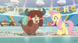 Size: 1366x768 | Tagged: safe, screencap, fluttershy, yona, pegasus, pony, yak, g4, she's all yak, bow, cloven hooves, crossed hooves, dotted line, duo, female, gym, hair bow, hoofprints, mare, monkey swings, paper, twisting