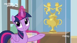 Size: 1280x720 | Tagged: safe, screencap, twilight sparkle, alicorn, pony, g4, she's all yak, adorkable, cute, dork, female, folded wings, glowing horn, horn, magic, mare, raised hoof, smiling, solo, trophy, twilight sparkle (alicorn), wings