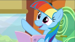 Size: 800x450 | Tagged: safe, screencap, rainbow dash, pegasus, pony, g4, the lost treasure of griffonstone, book, discovery family logo, fake smile, female, hoof hold, imitation, manebow sparkle, mare, multicolored mane, open mouth, raised hoof, reading, smiling, solo, talking, train