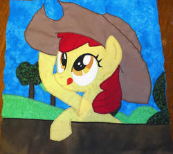 Size: 900x799 | Tagged: safe, artist:peruserofpieces, apple bloom, earth pony, pony, g4, applejack's hat, cowboy hat, female, filly, happy, hat, hill, irl, photo, quilt, quilt square, quilting, smiling, solo, tongue out, tree