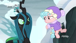 Size: 1366x768 | Tagged: safe, screencap, cozy glow, queen chrysalis, changeling, changeling queen, pegasus, pony, frenemies (episode), g4, clothes, discovery family logo, duo, female, filly, flying, foal, hat, snow, suspicious, winter outfit