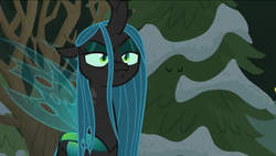 Size: 1136x640 | Tagged: safe, screencap, queen chrysalis, changeling, changeling queen, frenemies (episode), g4, female, smug, snow, solo, tree