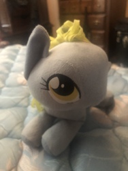 Size: 4032x3024 | Tagged: safe, artist:undeadponysoldier, photographer:undeadponysoldier, derpy hooves, pegasus, pony, g4, adorable face, bed, cute, eyelashes, female, irl, lying down, lying on bed, mare, photo, plushie