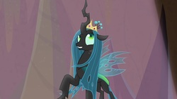 Size: 1920x1080 | Tagged: safe, screencap, queen chrysalis, changeling, changeling queen, frenemies (episode), g4, better way to be bad, crown, female, jewelry, looking up, regalia, smiling, solo, spotlight, when she smiles