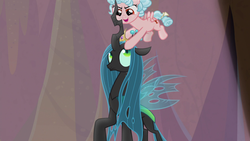 Size: 1920x1080 | Tagged: safe, screencap, cozy glow, queen chrysalis, changeling, changeling queen, pegasus, pony, frenemies (episode), g4, better way to be bad, crown, duo, female, filly, foal, jewelry, regalia, singing, spotlight