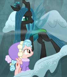 Size: 507x583 | Tagged: safe, screencap, cozy glow, queen chrysalis, changeling, changeling queen, pegasus, pony, frenemies (episode), g4, clothes, cropped, duo, female, filly, foal, hat, wind, winter outfit