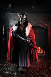 Size: 665x1000 | Tagged: safe, artist:essorille, king sombra, anthro, g4, clothes, fireplace, fursuit, irl, photo, solo, sword, weapon