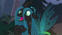 Size: 1920x1080 | Tagged: safe, screencap, queen chrysalis, changeling, frenemies (episode), g4, season 9, crown, fangs, female, former queen chrysalis, insanity, jewelry, open mouth, raised hoof, regalia, slit pupils, solo, spread wings, wide mouth, wings