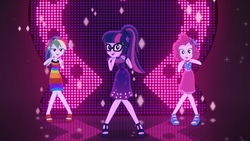 Size: 2048x1151 | Tagged: safe, pinkie pie, rainbow dash, sci-twi, twilight sparkle, equestria girls, equestria girls series, g4, i'm on a yacht, spoiler:eqg series (season 2), bare shoulders, clothes, cruise concert outfit, dancing, dress, female, geode of sugar bombs, geode of telekinesis, glasses, magical geodes, neon eg logo, open-toed shoes, ponytail, rainbow dash always dresses in style, sandals, sleeveless, trio, trio female