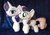 Size: 1280x889 | Tagged: safe, artist:peruserofpieces, rarity, sweetie belle, pony, unicorn, g4, comparison, duo, female, filly, happy, horn, irl, lidded eyes, mare, photo, plushie, profile, siblings, side by side, sisters, smiling, toy