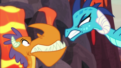 Size: 2100x1180 | Tagged: safe, screencap, billy, princess ember, dragon, g4, sweet and smoky, angry, dragon lands, dragoness, duo, female, furious, gritted teeth, horns, lava, male, narrowed eyes, scared, snarling