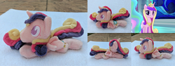 Size: 3176x1192 | Tagged: safe, screencap, princess cadance, alicorn, pony, g4, beanie (plushie), chibi, crown, female, horn, irl, jewelry, lying down, mare, minky, missing accessory, no mouth, no nose, no pupils, photo, plushie, profile, prone, regalia, smiling, solo, sploot, toy, wings