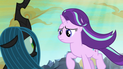 Size: 1280x720 | Tagged: safe, screencap, queen chrysalis, starlight glimmer, changeling, changeling queen, pony, unicorn, g4, to where and back again, changeling hive, cloud, duo, female, mare, ruins, sunlight, windswept mane