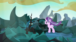 Size: 1280x720 | Tagged: safe, screencap, queen chrysalis, starlight glimmer, changeling, changeling queen, pony, unicorn, g4, to where and back again, changeling hive, cloud, duo, female, mare, ruins, sunlight, windswept mane