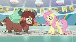 Size: 1280x720 | Tagged: safe, screencap, fluttershy, yona, pegasus, pony, yak, g4, she's all yak, bow, cloven hooves, confetti, duo, female, hair bow, mare, monkey swings