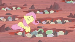 Size: 1920x1080 | Tagged: safe, screencap, fluttershy, pony, g4, sweet and smoky, dragon egg, egg, eyes closed, female, mare, prone, solo