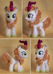 Size: 1657x2300 | Tagged: safe, artist:buttercupbabyppg, autumn blaze, kirin, g4, sounds of silence, beanie (plushie), cloven hooves, female, happy, horn, irl, leonine tail, photo, plushie, smiling, solo, standing