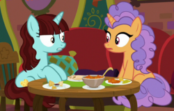 Size: 587x376 | Tagged: safe, screencap, pretzel twist, say cheese, pony, unicorn, g4, the point of no return, background pony, cropped, duo, female, food, looking at each other, mare, shipping fuel, sitting, table, the tasty treat