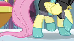 Size: 1280x720 | Tagged: safe, screencap, fluttershy, pegasus, pony, g4, sparkle's seven, clothes, costume, dangerous mission outfit, female, goggles, hoodie, legs, mare, pictures of legs, solo